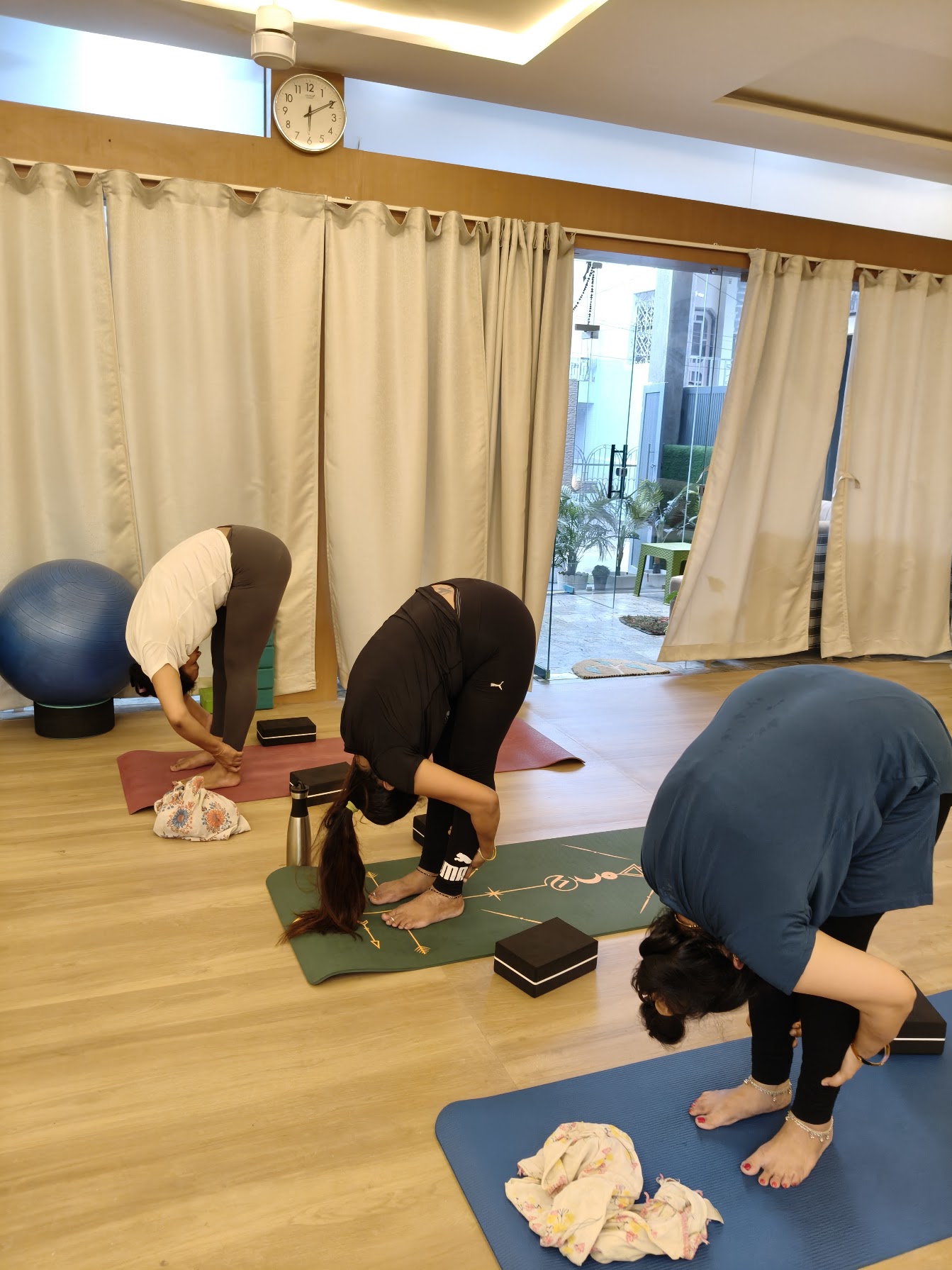 Student in deep forward stretch posture